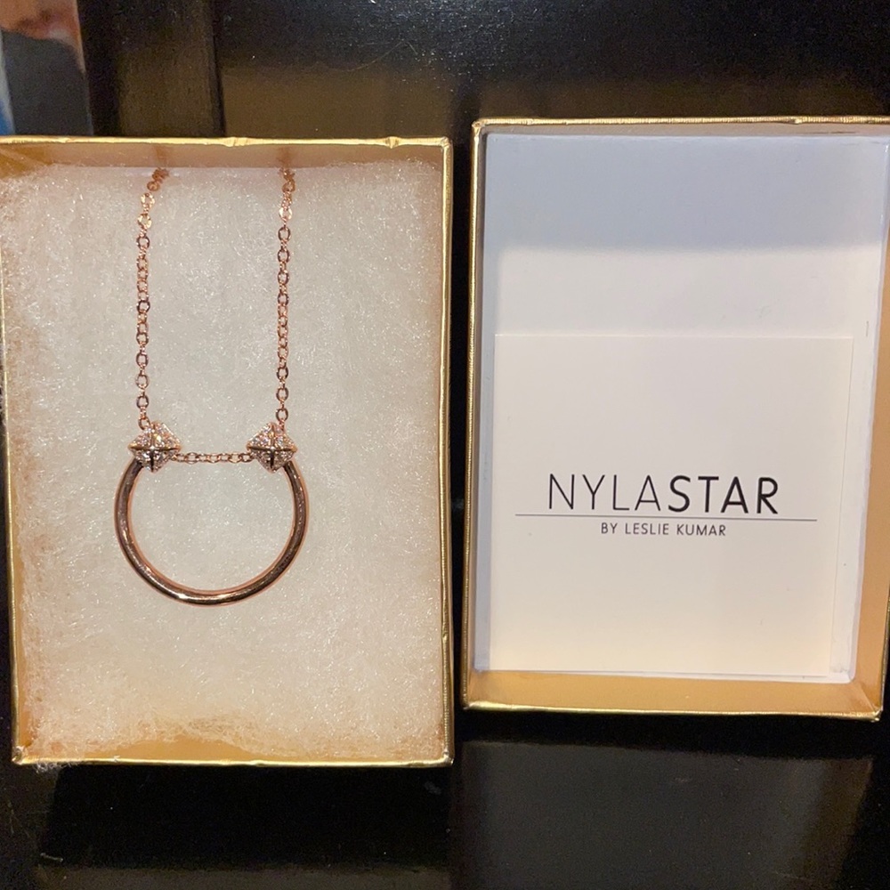NYLASTAR Rose Gold pyramid studded horn pendant hangs on delicate 30" necklace.
